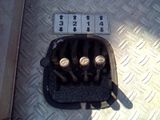 a picture of a bunch of screws in a box