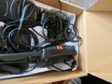 a box with a bunch of hair dryers and a blow dryer