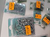 a lot of screws that are on the table
