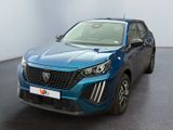vue de face d'un SUV bleu garé dans un showroom