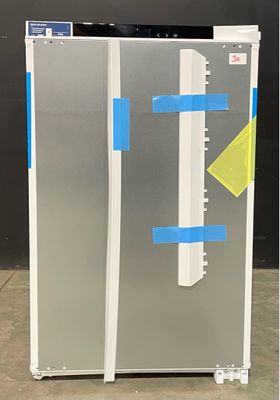 an image of a refrigerator with tape taped around it