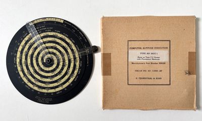 a record with a picture on it next to a box