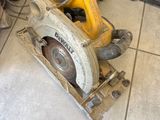 a picture of a circular saw sitting on a tile floor