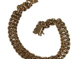 a gold chain bracelet with a lock on a white background