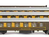 three brown and yellow train cars sitting next to each other on a white surface