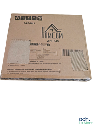 emballage d'un nouveau produit « Home Com » présenté dans une boîte sur fond blanc