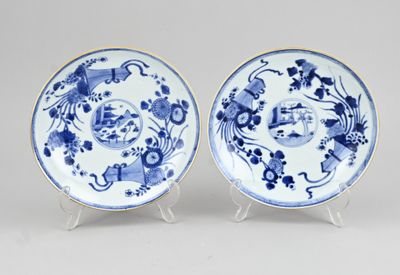 pair of chinese blue and white plates on stands