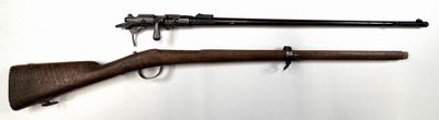 an old gun and a rifle on a white background