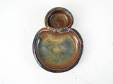 a picture of a brown and blue bowl with a lid