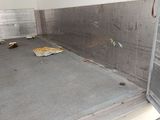 an image of the inside of a commercial kitchen