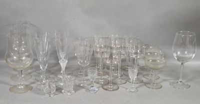 a lot of wine glasses that are sitting on a table