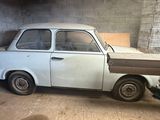 a small car that is parked in a garage