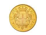 l'image d'une pièce d'or ornée d'une couronne