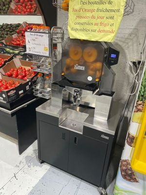 many fruits and vegetables on display in a store
