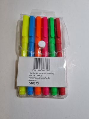a bunch of markers in a plastic container on a table