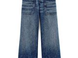 the jeans are blue and have buttons on the side of them