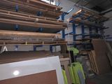 a room filled with lots of shelves and pallets