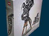 a box that has a toy camera on top of it
