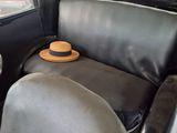 a hat that is sitting on the back of a car
