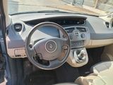 a picture of a car dashboard with a steering wheel