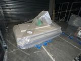 a pile of cardboard sitting on top of a pallet in a warehouse