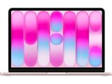 an apple macbook air is shown with a pink and blue background
