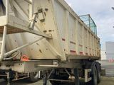 an image of a dump truck parked in a parking lot