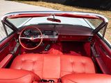 a red car with a red leather seat and dashboard