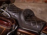 a close up of a motorcycle parked in a garage