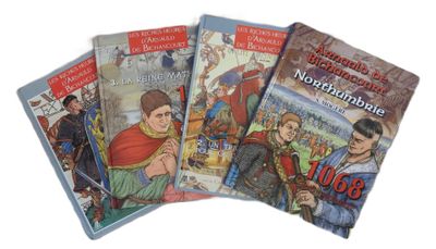 quatre livres pour enfants sont alignés sur une surface blanche