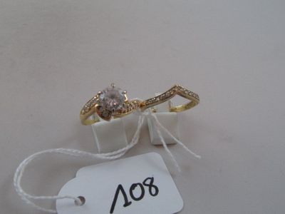 a tag with a picture of two wedding rings on it