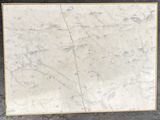 a picture of a white marble slab on the ground