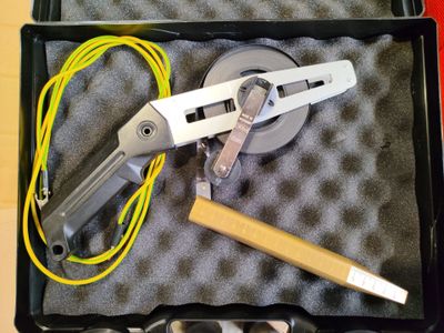 a tool in a case that is sitting on a table