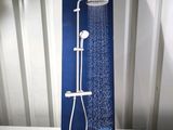 a box that has a shower in it on a table