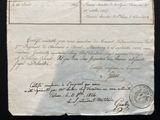 an old document with a stamp on it sitting on top of a table
