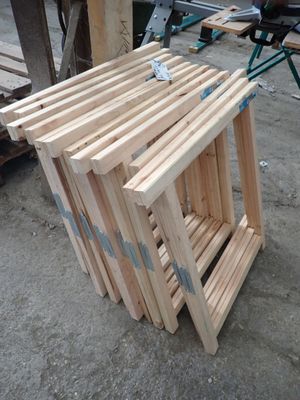 several pieces of wood are stacked on top of each other