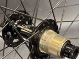 a close up of a bicycle wheel with spokes