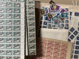 many different types of stamps on a table