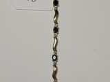 a picture of a silver and black beaded necklace
