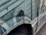 a van that has been vandalized with graffiti on the side of it