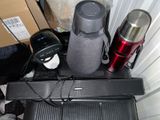 a lot of electronics that are sitting on top of a table