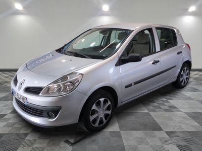 a picture of a silver car parked in a garage