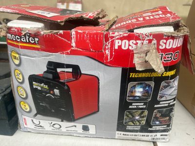 emballage d'une boîte contenant une soudeuse rouge et noire