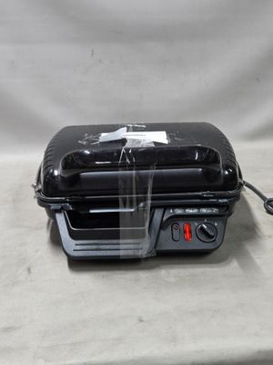 une image représentant un grille-pain posé sur une table