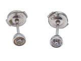pair of diamond stud earrings on a white background