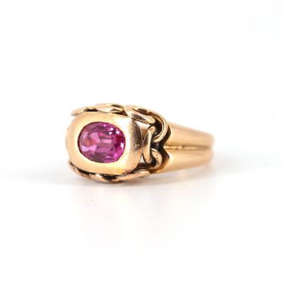 Bague en or jaune 750‰ sertie d'un saphir rose synthétique V…