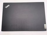 a black laptop that is sitting on a table