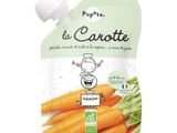 un sac de carottes posé sur une table