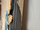 a piece of cardboard that has been torn off of the wall