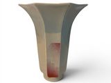 a white vase with a red stripe on it